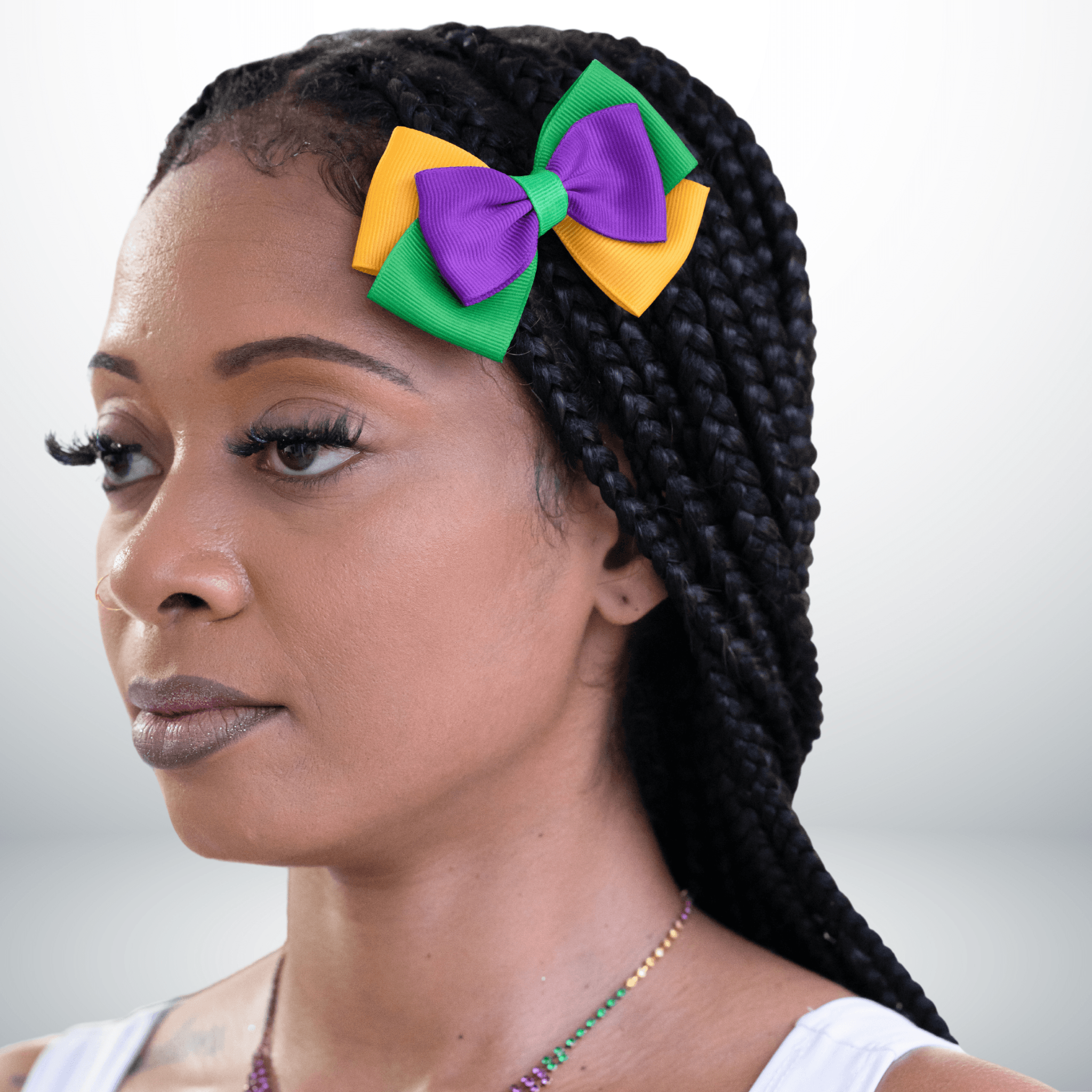 Mardi Gras Hair Bow and Elastic Set in purple, green, and gold with matching elastic hair ties, perfect for festive celebrations