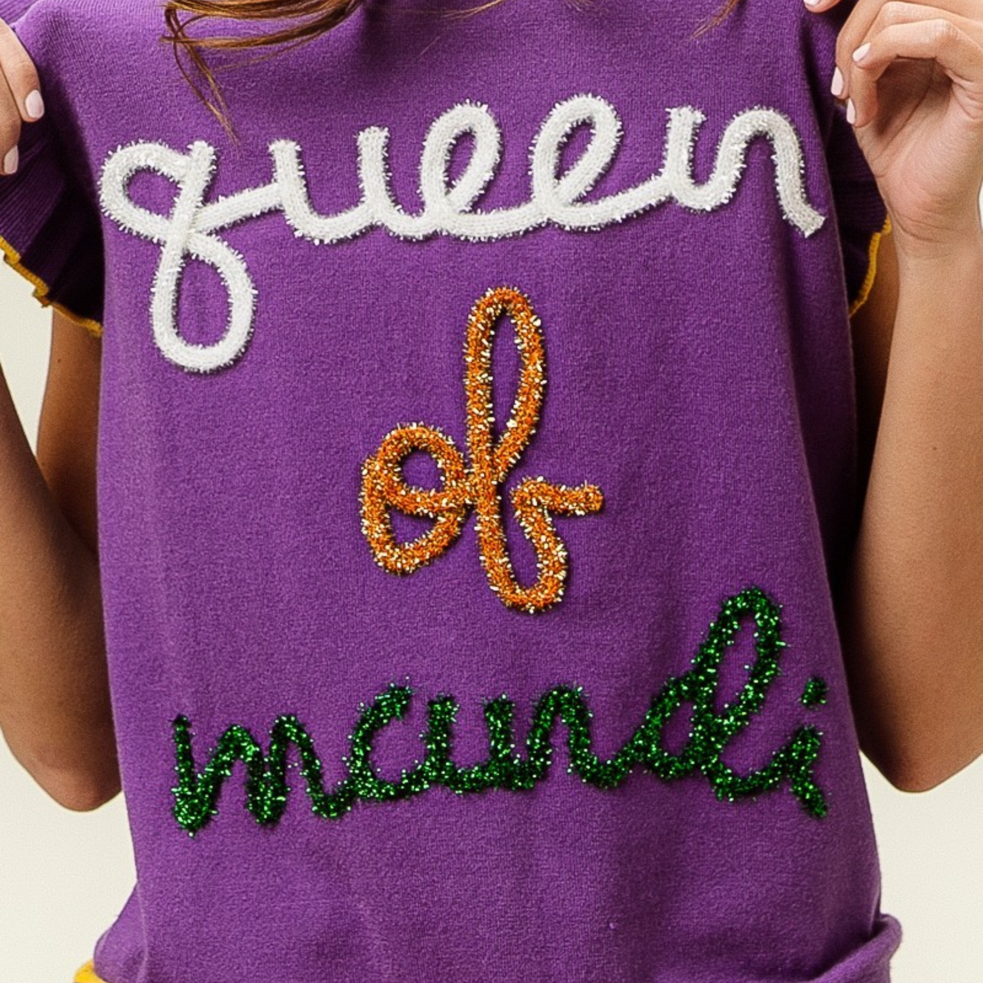 Queen Of Mardi Ruffled Armhole Sleeveless Knit Top