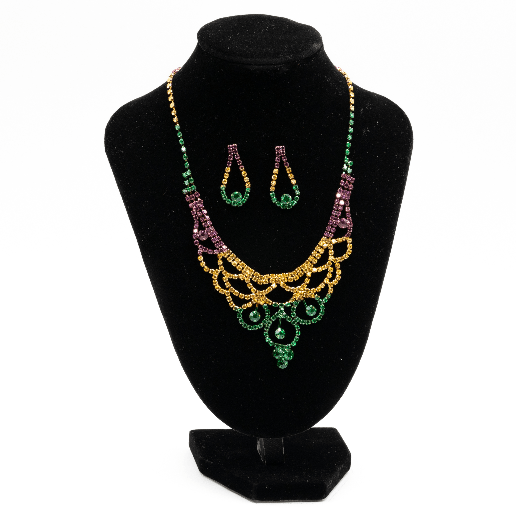 Mardi Gras rhinestone fan necklace in gold, green, and purple with layered fan-like design on a black display.