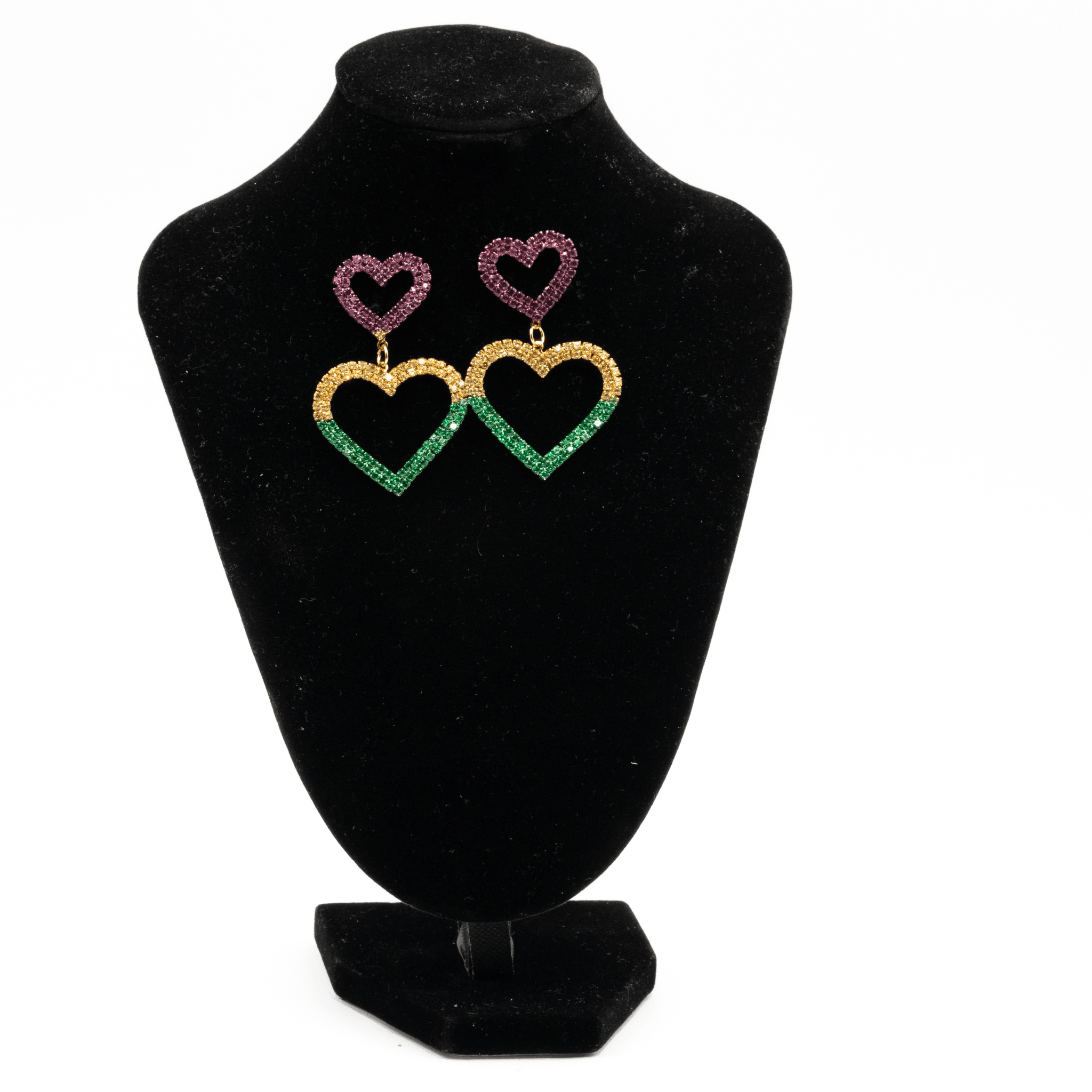 Mardi Gras rhinestone heart drop earrings in purple, green, and gold displayed on a black stand.