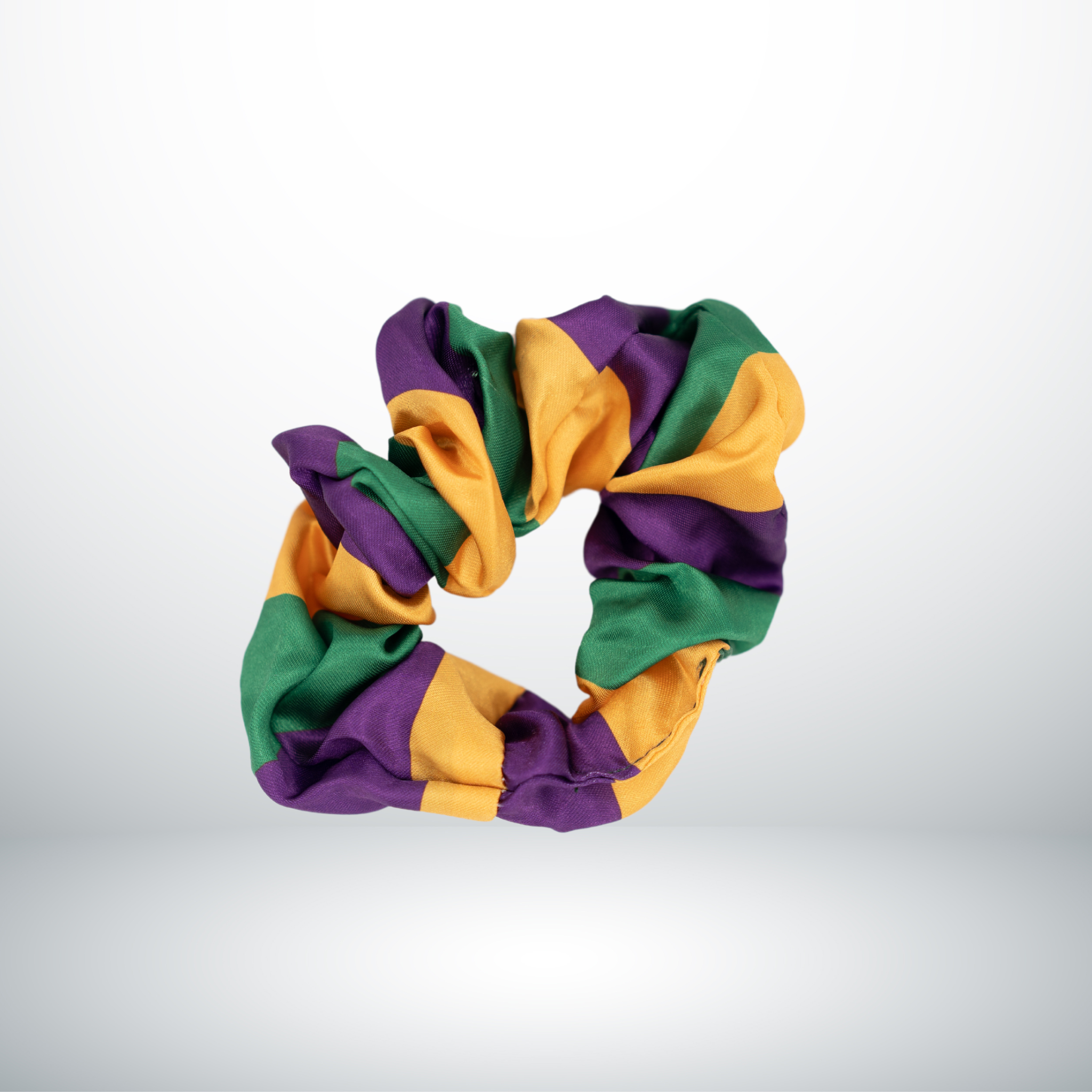 Mardi Gras Striped Scrunchie in purple, green, and gold.